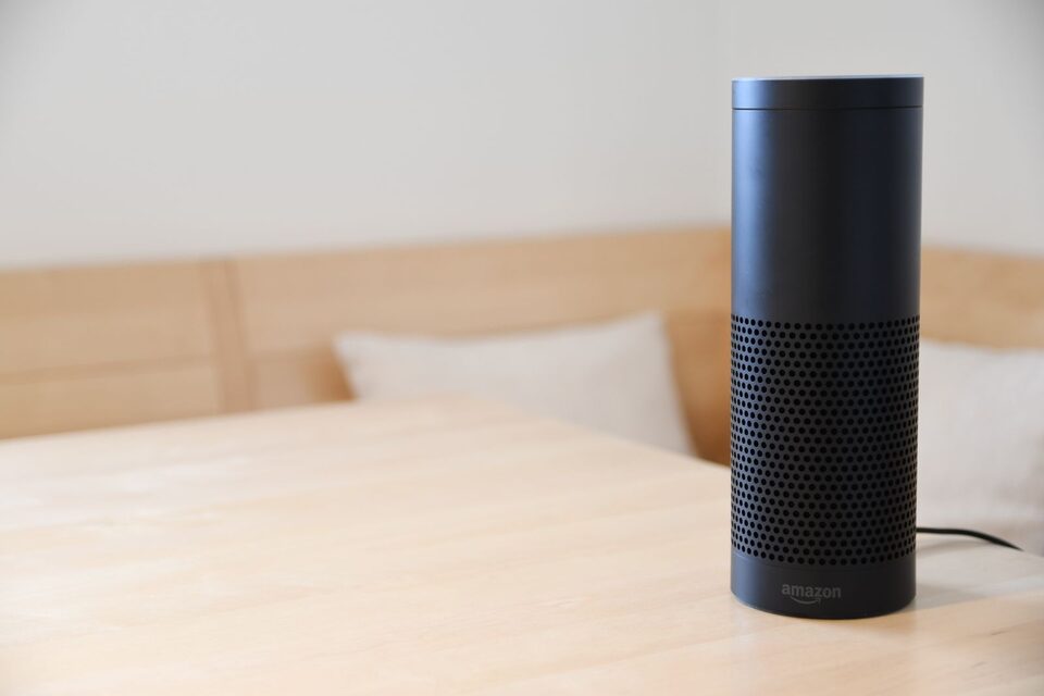 A black smart speaker on a table, illustrative photo.